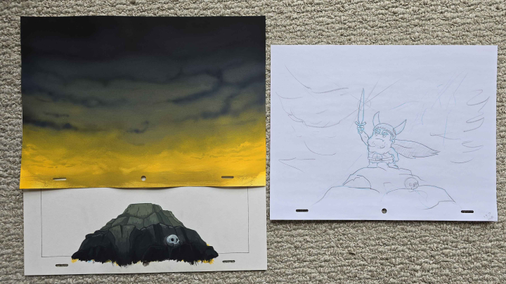 A photo of the background painting layers and rough sketch of this animated scene.